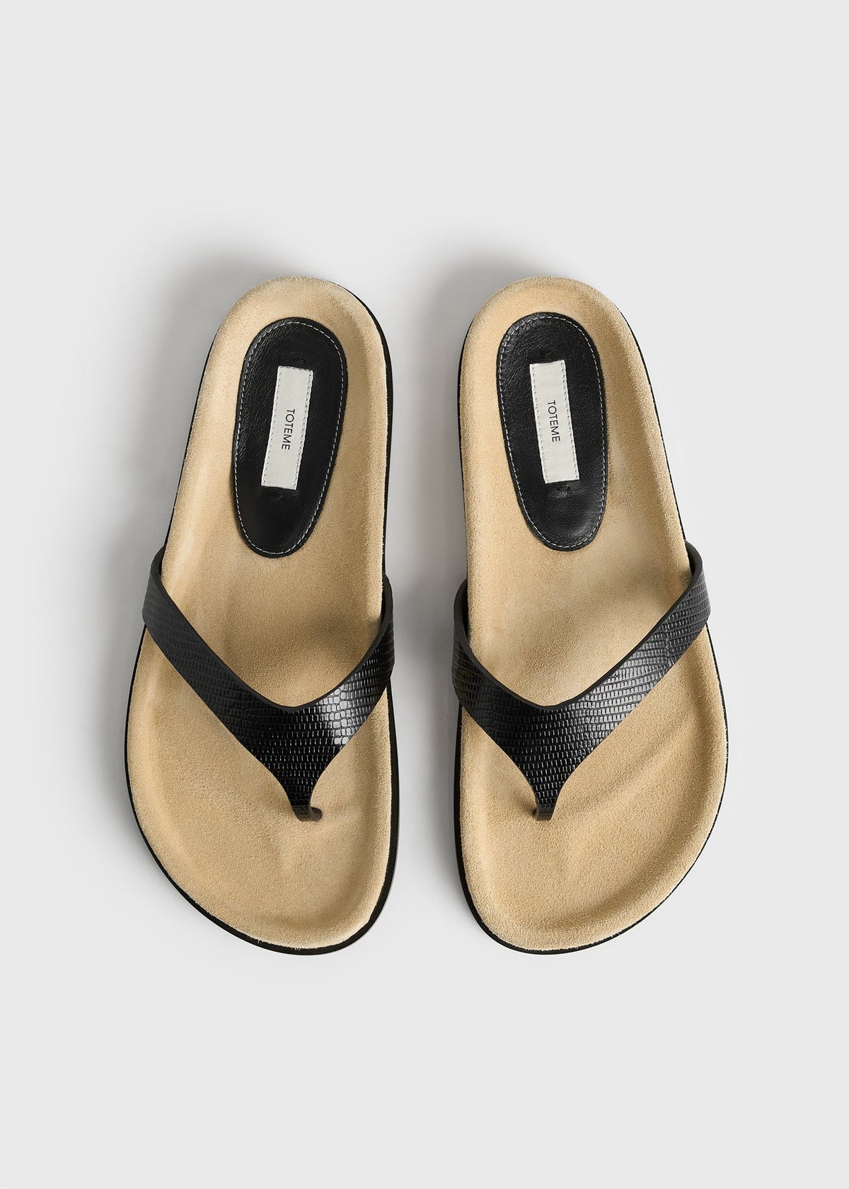 Contoured lizard-embossed flip flops beige/black