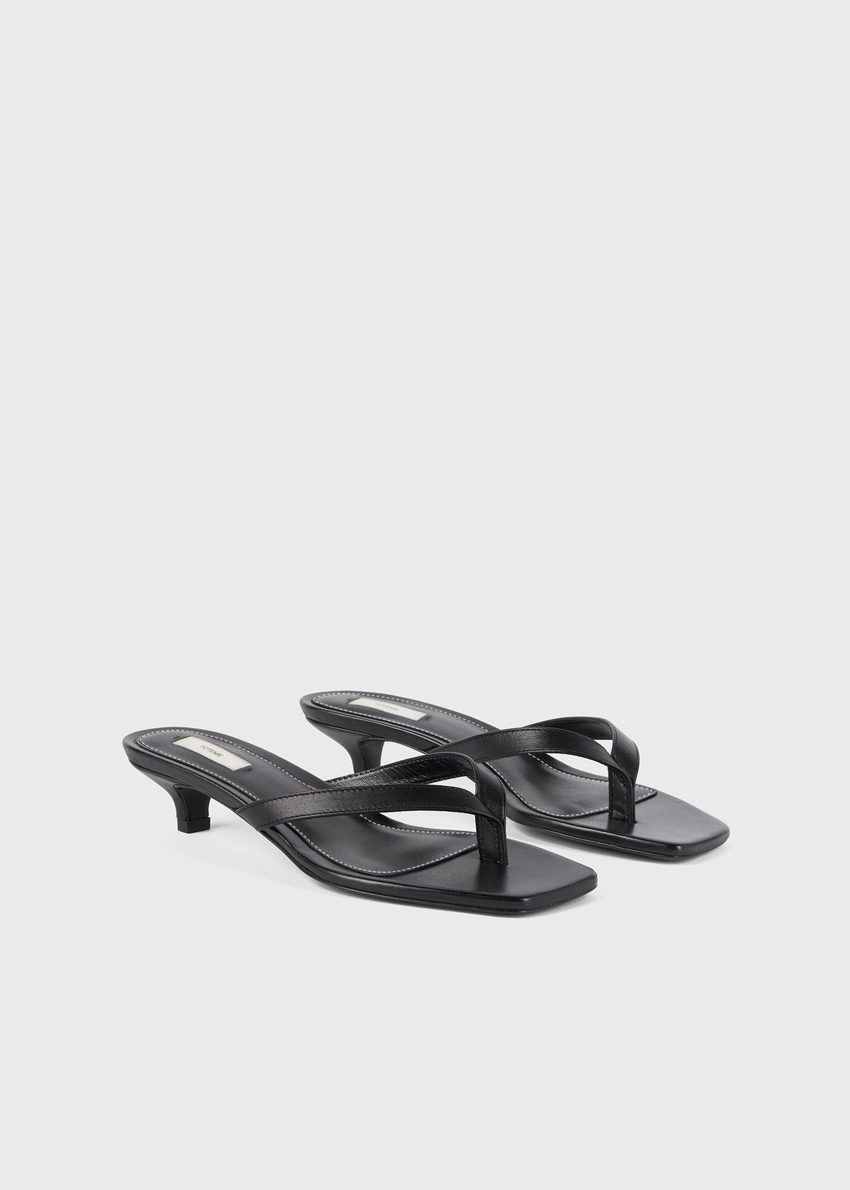 Leather heeled flip flops black